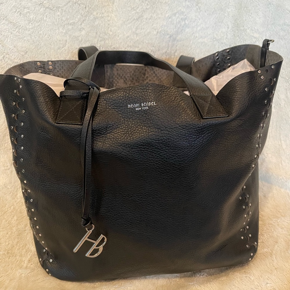 Like new Henri Bendel large reversible leather/snake skin, black & grey tote